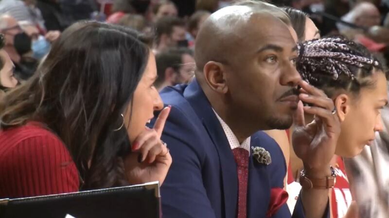 Nebraska Women's Basketball Associate Head Coach Chuck Love next to Head Coach Amy Williams.
