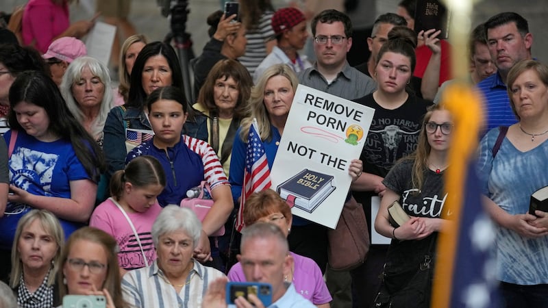 People gather during a rally Wednesday, June 7, 2023, at the Utah State Capitol, in Salt Lake...