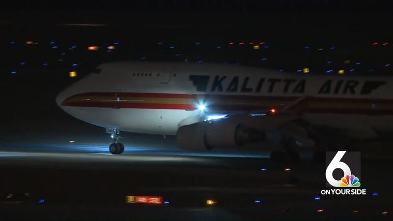 A jet containing 57 people quarantined for coronavirus arrives at Eppley Airfield on Friday...