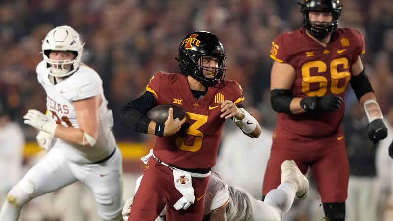 Iowa State quarterback Rocco Becht (3) is sacked by Texas defensive lineman Byron Murphy,...