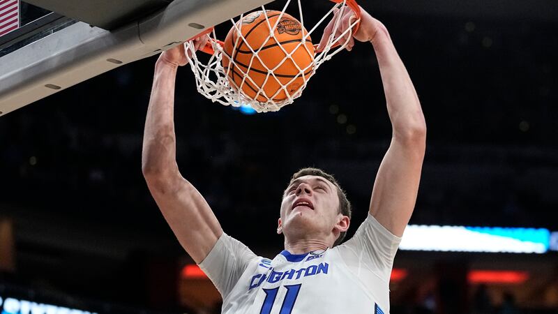 Creighton center Ryan Kalkbrenner (11) makes the dunk against Princeton in the second half of...