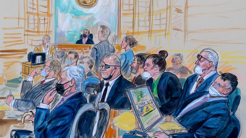 FILE - This artist sketch depicts the trial of Oath Keepers leader Stewart Rhodes and four...