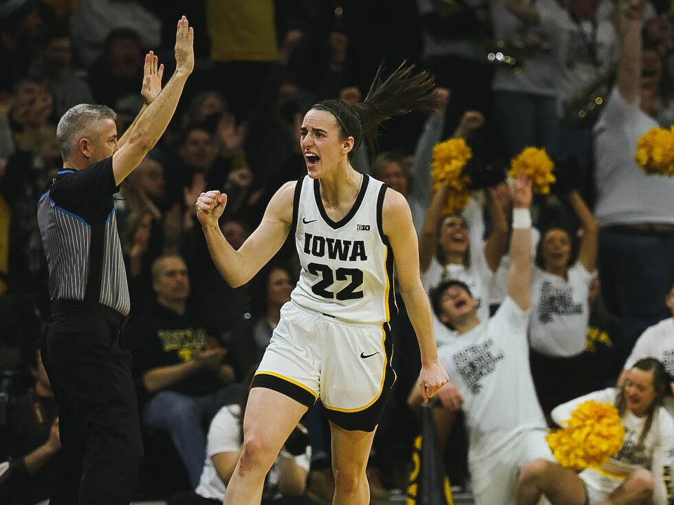 Caitlin Clark celebrates after a made basket on Saturday, Jan. 28, 2023, during a game against...
