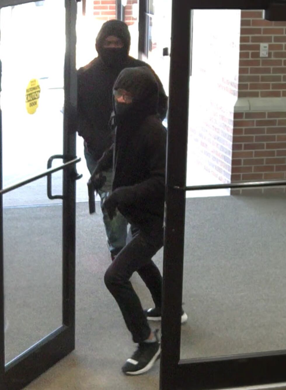 Police are looking for two people who robbed a west Omaha bank branch on Thursday, Jan. 26, 2023.